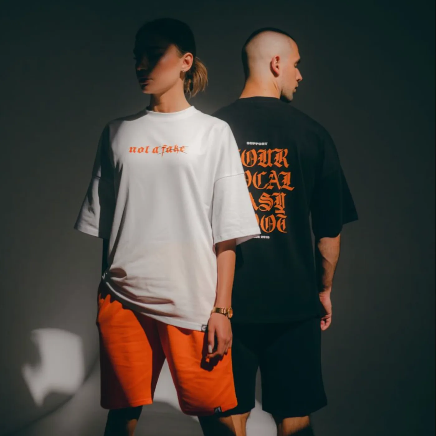 Oversized T-shirts showing front and back printed graphics